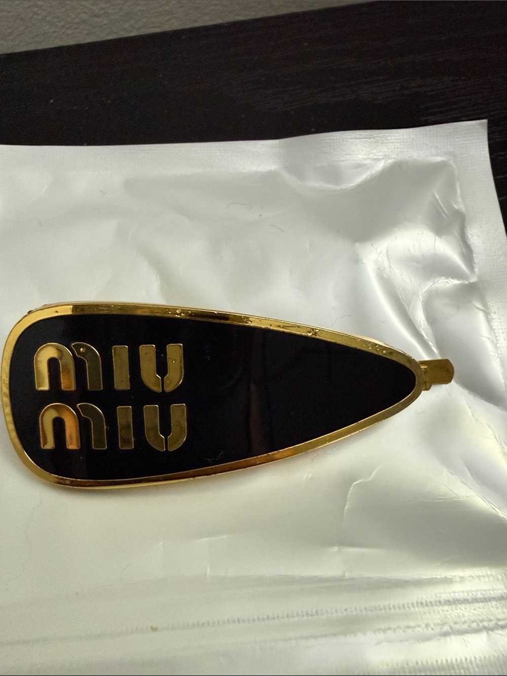 Miu Miu Black and Gold Logo Barrette